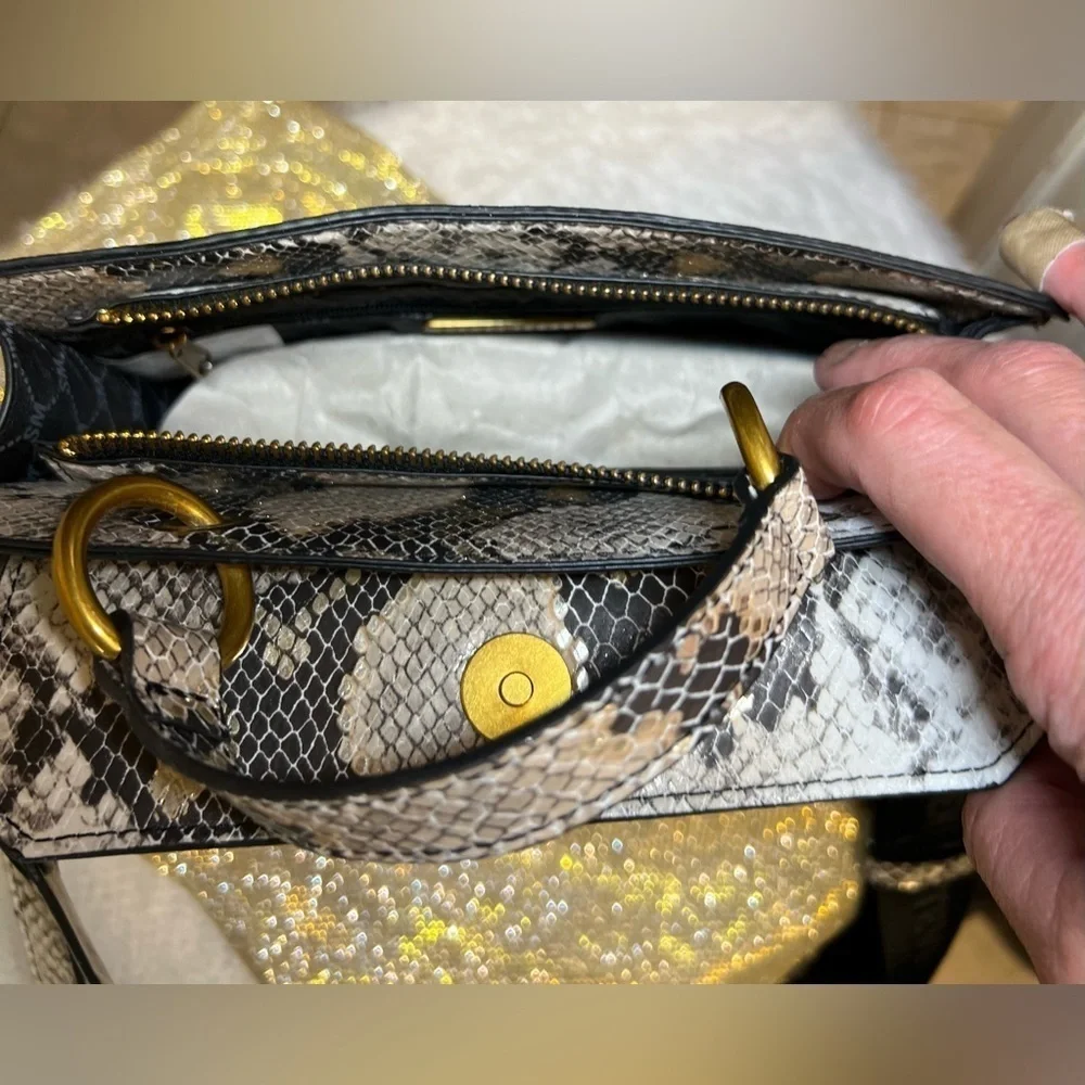 Steve Madden can pouch